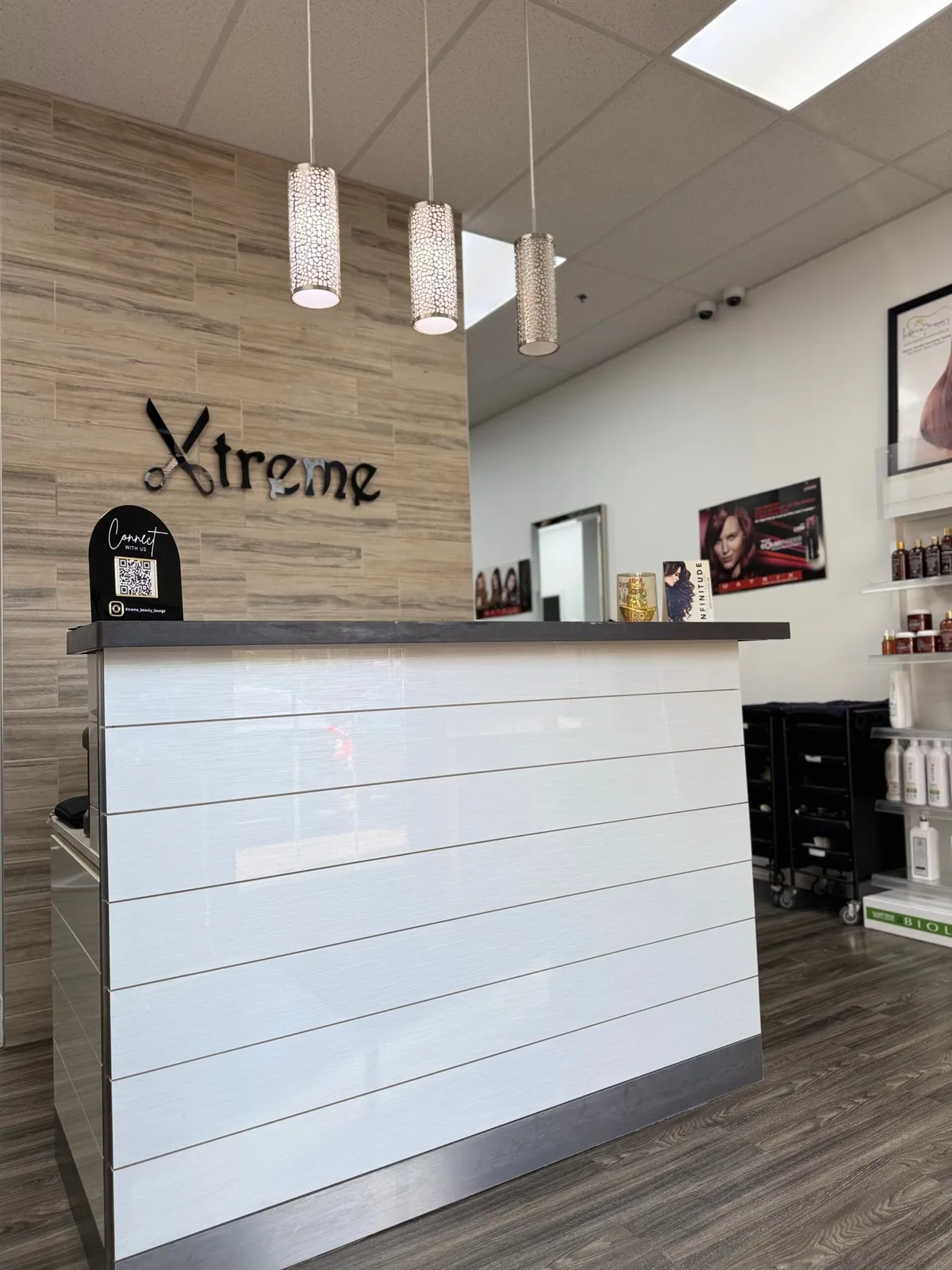 The reception area and Xtreme salon signage