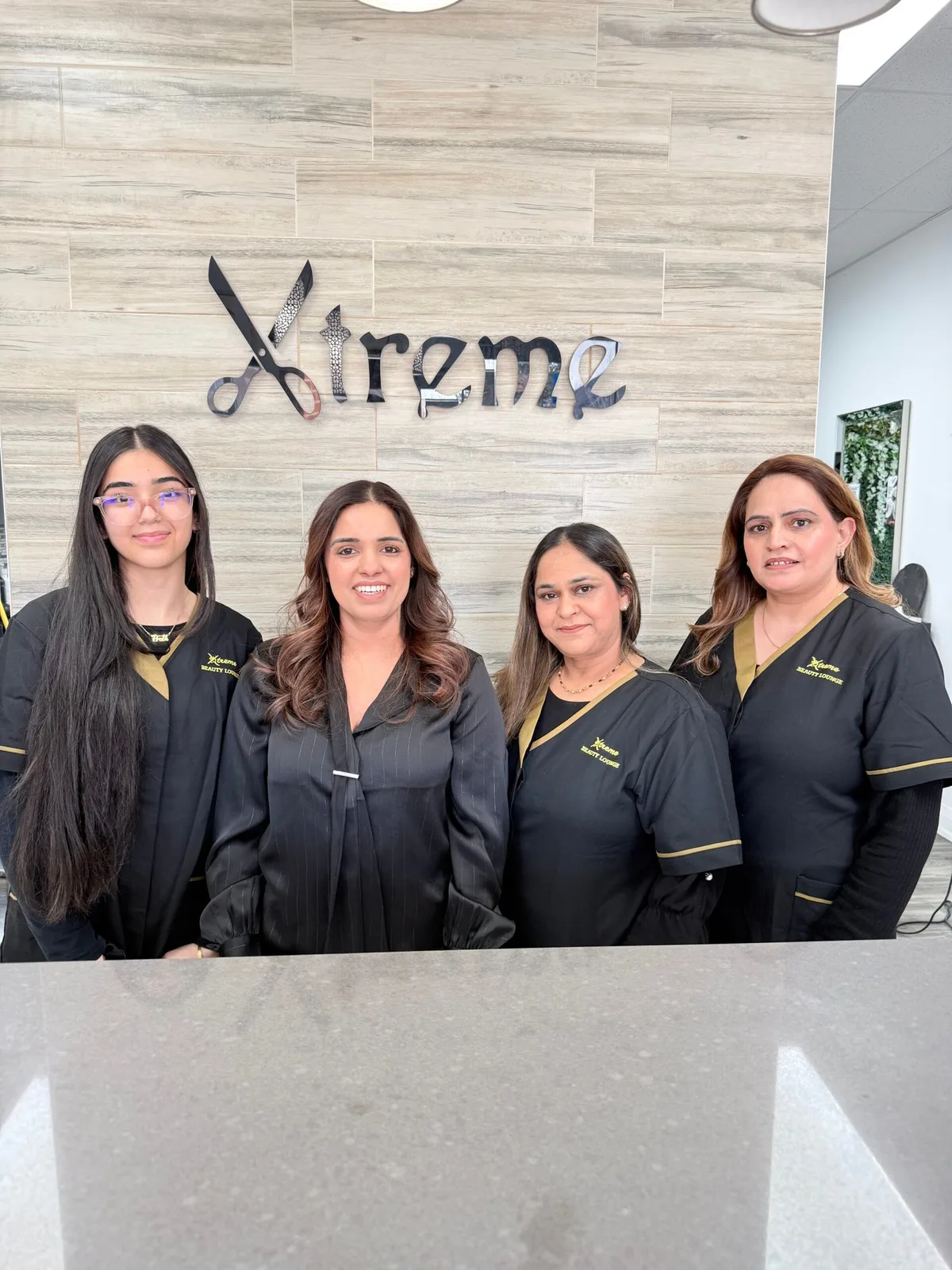 The Xtreme team at the salon reception desk