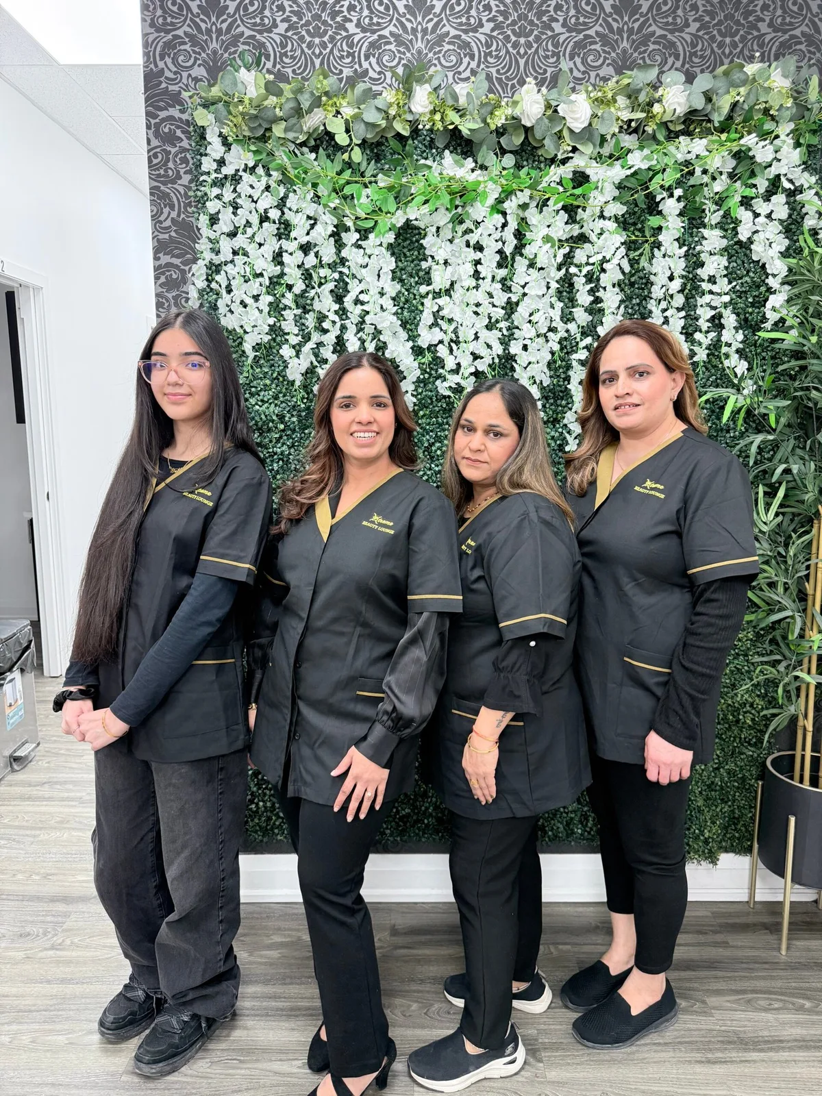 Four Xtreme Beauty Lounge team members in the salon
